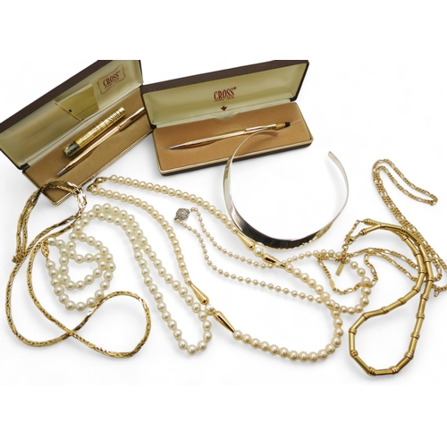 925 - A silver torc necklace, A Cross gold plated pen and pencil set, two Napier costume jewellery chains ... 