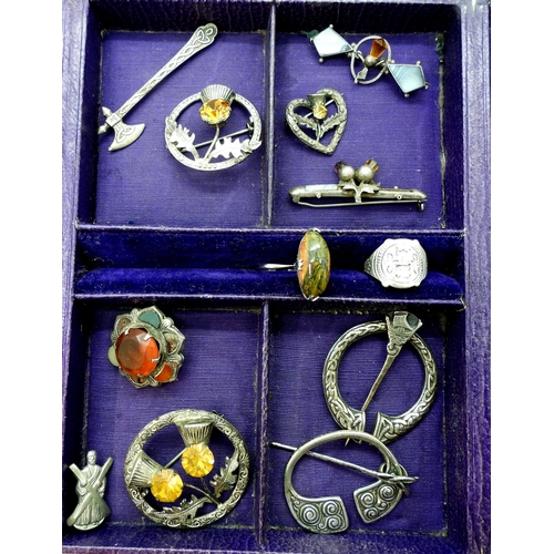 926 - Scottish themed jewellery to include an Iain MacCormick, pen annular brooch, a further example by Wa... 