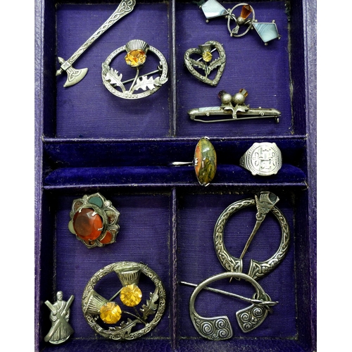 926 - Scottish themed jewellery to include an Iain MacCormick, pen annular brooch, a further example by Wa... 