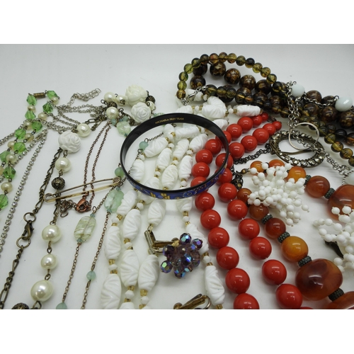 927 - Vintage costume jewellery beads  and pendants to include a Michaela Frey enamelled bangle