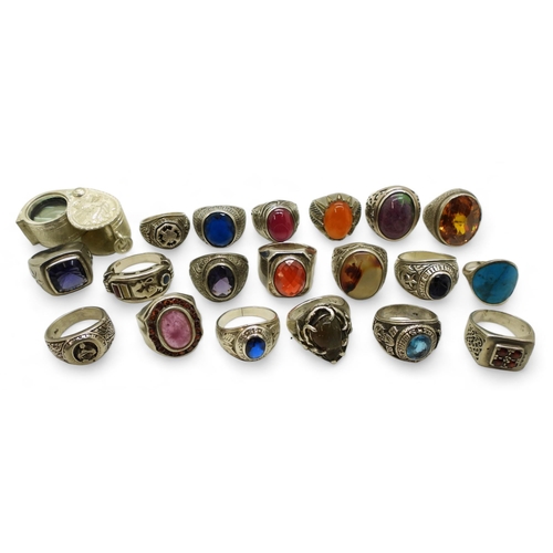 929 - A collection of silver and white metal gem set rings to include ruby-zoisite, agate, turquoise, opal... 