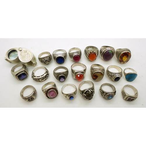 929 - A collection of silver and white metal gem set rings to include ruby-zoisite, agate, turquoise, opal... 