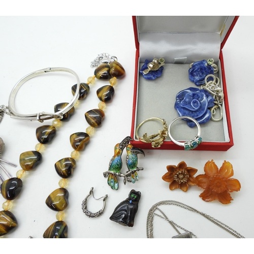 932 - A silver rose pendant and earring suite set with sodalite and peridot, a silver enamel and Marcasite... 