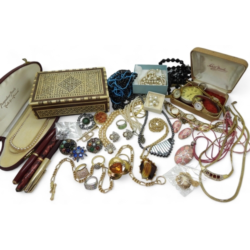 943 - A collection of vintage costume jewellery, to include faux pearls, items by Miracle, watches and two... 