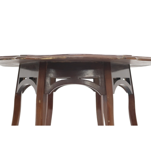 2036 - AN EDWARDIAN MAPLE WINDOW TABLE IN THE MANNER OF BEARD WATSON OF SYDNEY AUSTRALIA with shaped w... 