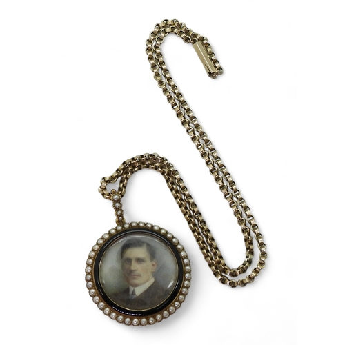 2793 - A 15CT PORTRAIT MINIATURE PENDANTthe portrait of a young man, is encircled with black enamel and pea... 