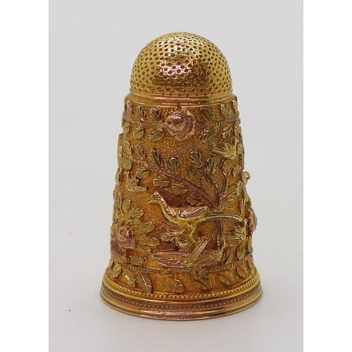 2803 - A DECORATIVE THIMBLEin bright yellow metal with rose gold embellished Cherubs, birds, roses  an... 