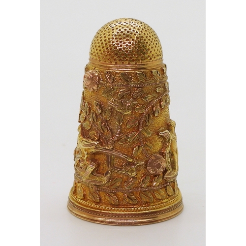 2803 - A DECORATIVE THIMBLEin bright yellow metal with rose gold embellished Cherubs, birds, roses  an... 