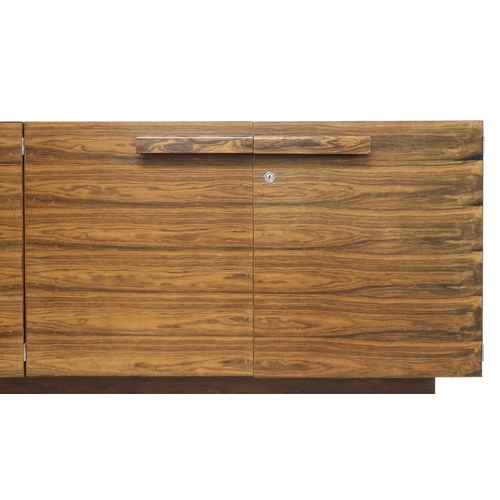 2093 - A MID 20TH CENTURY ROSEWOOD TREVOR CHINN F.S.I.A.D. FOR GORDON RUSSELL SIDEBOARD with four cabinet d... 