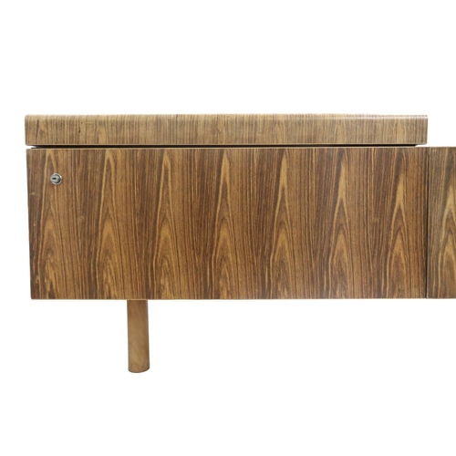 2094 - A MID 20TH CENTURY ROSEWOOD TREVOR CHINN F.S.I.A.D. FOR GORDON RUSSELL L SHAPED DESKwith three drawe... 