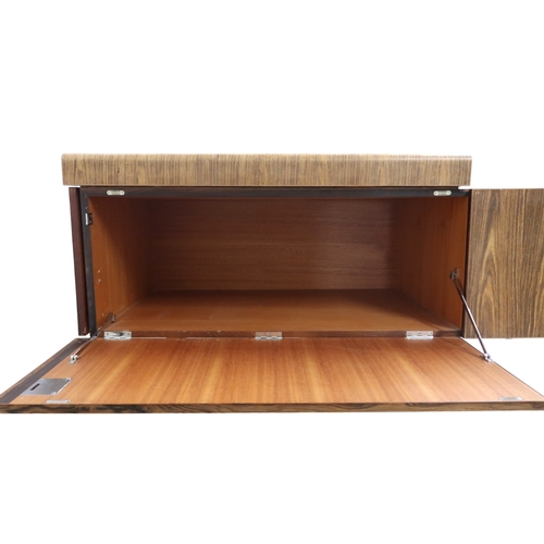 2094 - A MID 20TH CENTURY ROSEWOOD TREVOR CHINN F.S.I.A.D. FOR GORDON RUSSELL L SHAPED DESKwith three drawe... 