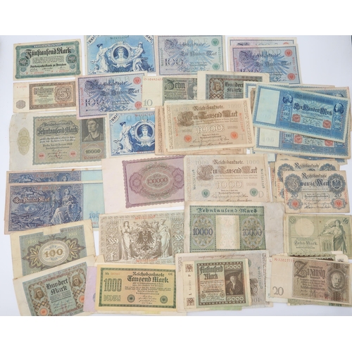 306 - GERMANY a quantity of Reichsbanknote together with banknotes from the far east and South East Asia