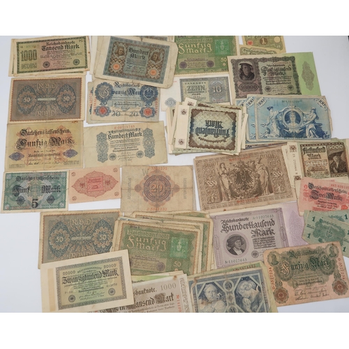 306 - GERMANY a quantity of Reichsbanknote together with banknotes from the far east and South East Asia