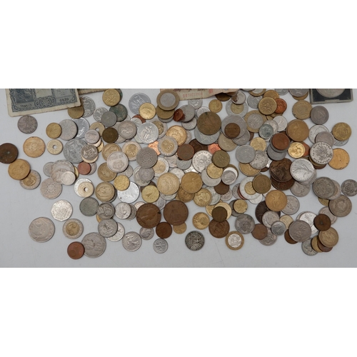 308 - A lot comprising worldwide coins and banknotes