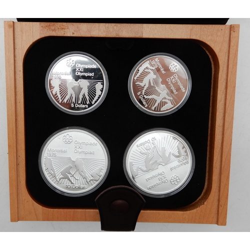 311 - Canada Montreal Olympics 1976 silver four coin proof sets in presentation cases (4)