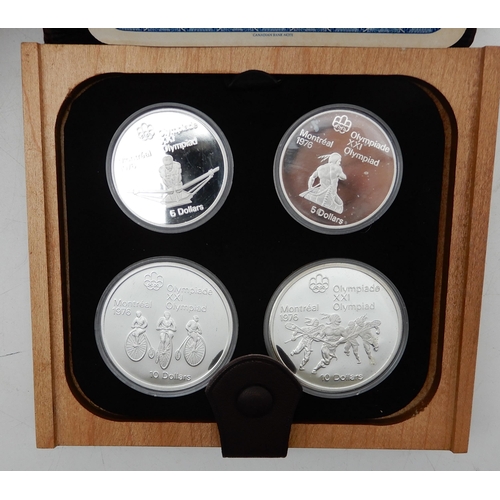 311 - Canada Montreal Olympics 1976 silver four coin proof sets in presentation cases (4)