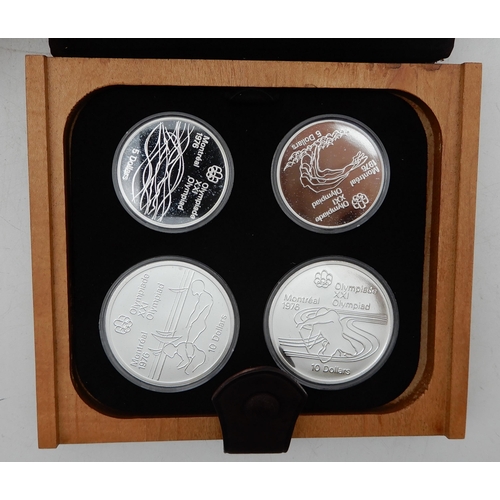 311 - Canada Montreal Olympics 1976 silver four coin proof sets in presentation cases (4)