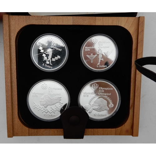 311 - Canada Montreal Olympics 1976 silver four coin proof sets in presentation cases (4)