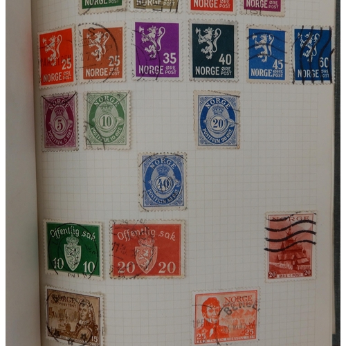 315 - The F.G. Cadet Album a worldwide stamps used and hinged  