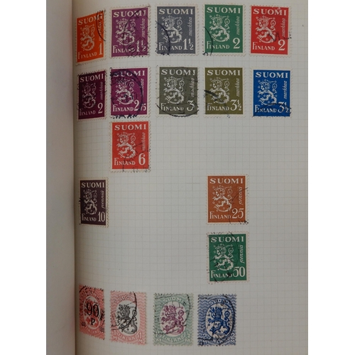 315 - The F.G. Cadet Album a worldwide stamps used and hinged  