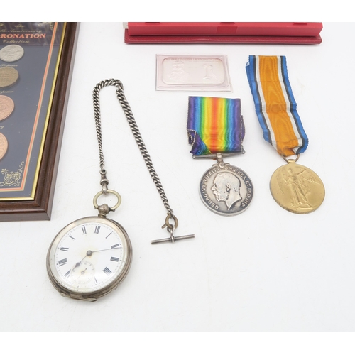 337 - A mixed lot comprising a WW1 Victory and British War Medal pair awarded to 49084 Pte. W.M. Scholes, ... 