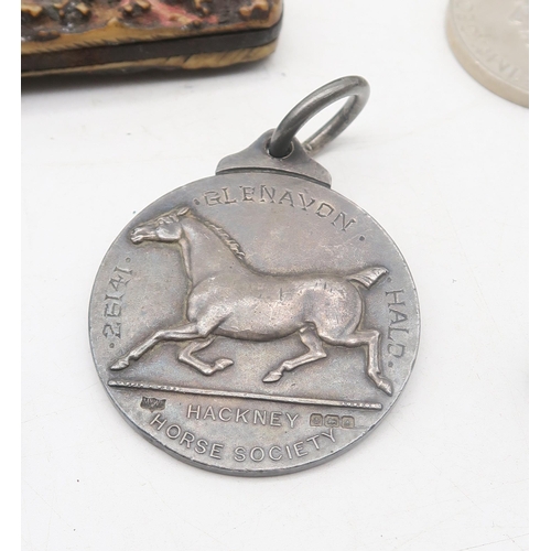 339 - A large and eclectic mixed lot, comprising a silver Hackney Horse Society medal, engraved 