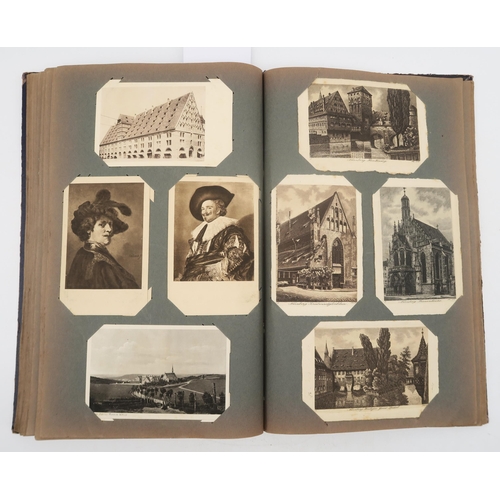 341 - An album of early-20th century German illustrated and photographic postcards, to include views of Cr... 