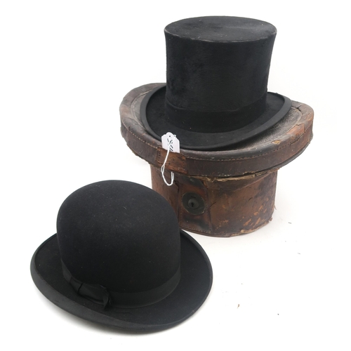 364 - A silk top hat by Tress & Co., retailed by A.P. Dalzell of Belfast, of small-medium size, measur... 