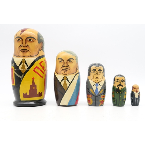 366 - A collection of Russian dolls, to include examples depicting 20th century Russian leaders, from Leni... 