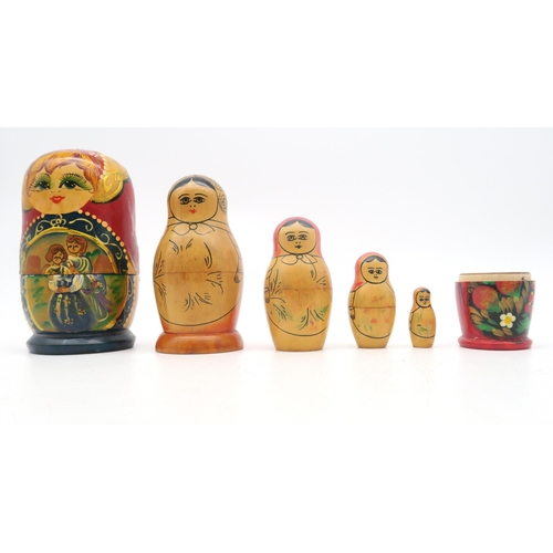 366 - A collection of Russian dolls, to include examples depicting 20th century Russian leaders, from Leni... 