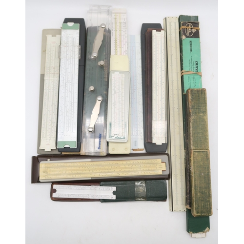 368 - A collection of draughtsman's slide rules, a cased Sykes Hydrometer etc.