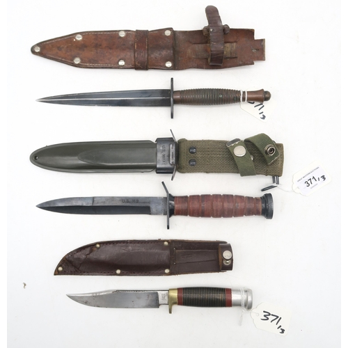 371 - A Fairbairn-Sykes Third Pattern Commando knife, housed in a leather scabbard; together with an Ameri... 