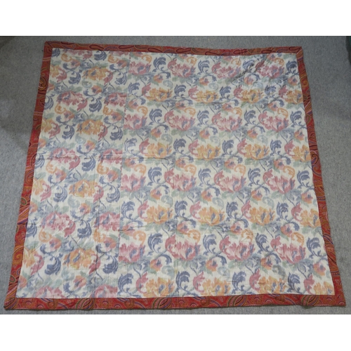 375 - A contemporary printed Paisley pattern quilted throw, measuring approx. 165cm x 159cm