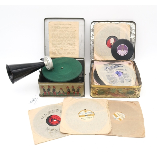 376 - A Bing Pigmyphone (miniature gramophone), in tin case, together with a selection of corresponding mi... 