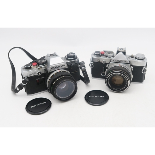 377 - An Olympus OM2N camera fitted with an OM-System S Zuiko Auto-Zoom 35-70mm 1:4 lens, Super Ozeck II A... 