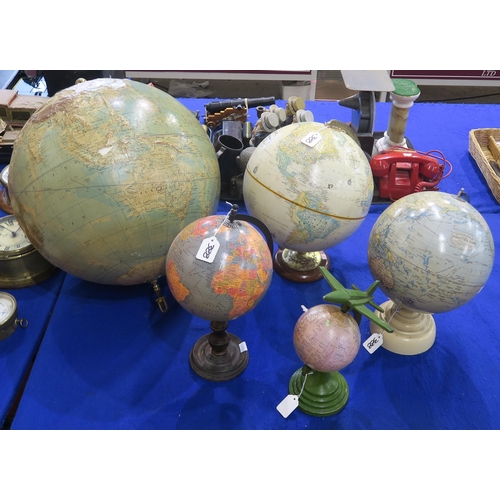 388 - Five globes of varying scale, to include a 