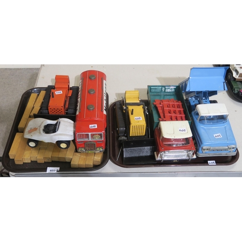 405 - Tonka toy vehicles, comprising two bulldozers, a hydraulic dumper truck and a flatbed truck, alongsi... 