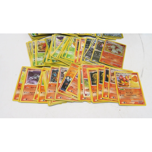 420 - A collection of Pokemon and Future Card Buddyfight cards, together with a Topps Match Attax trading ... 