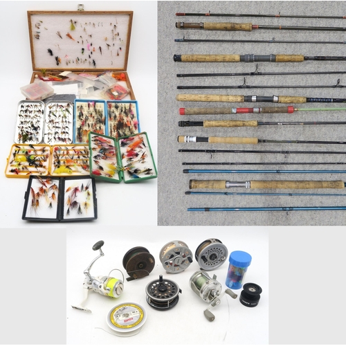 422 - Fishing tackle, comprising a quantity of cased flies and lures; reels to include Leeda Rimfly Magnum... 