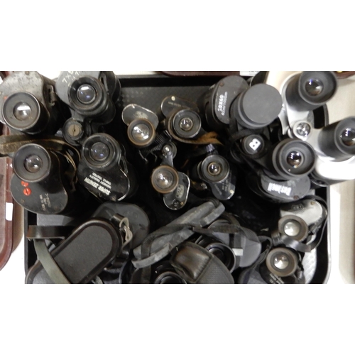 428 - A lot comprising  monoculars and binoculars various makers and models