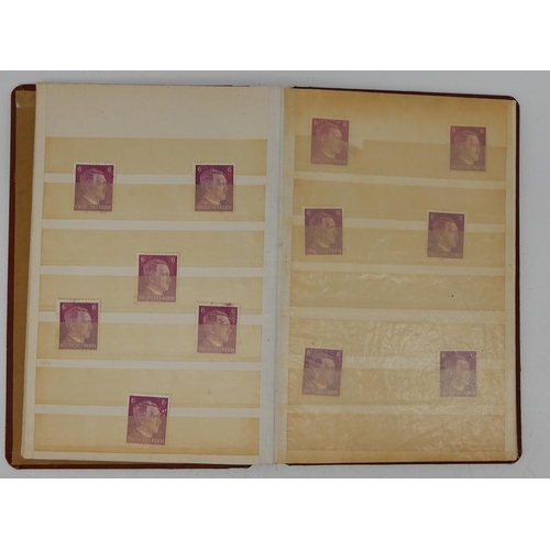 429 - The Albion Stamp Album with various worldwide stamps together with a small stock book with Deutsches... 