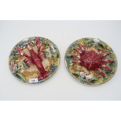 161 - A pair of Palissy style plates, one with a lobster, the other a crab