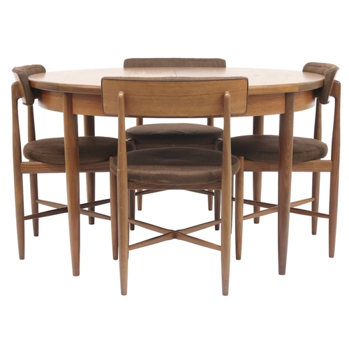 2098 - A MID 20TH CENTURY TEAK G PLAN FRASCO DINING TABLE AND FOUR CHAIRS circular extending dining ta... 