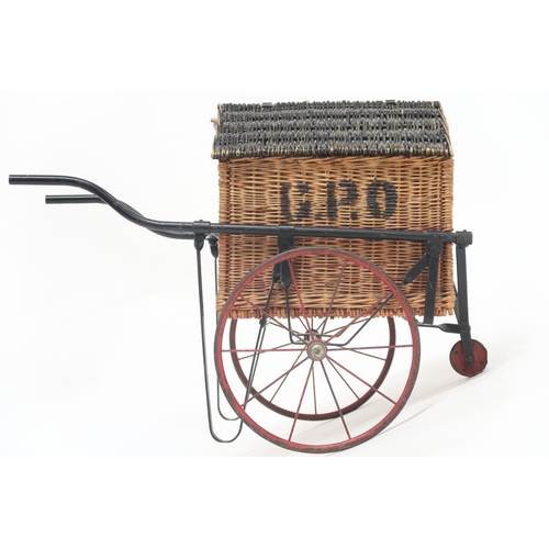 2100 - A CIRCA 1940 TRI-ANG G.P.O WICKER THREE WHEEL DELIVERY CART with detachable wicker hinged top l... 