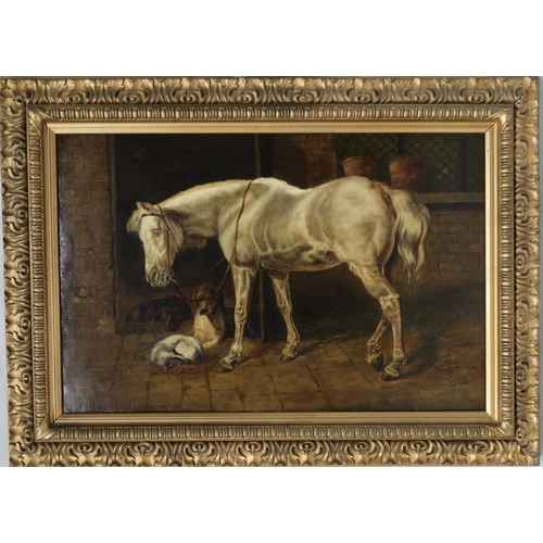 901 - B. BROWNLOW (SCOTTISH 19th CENTURY) IN THE STABLE Oil on canvas, signed lower left, dated 1884, 48.5... 