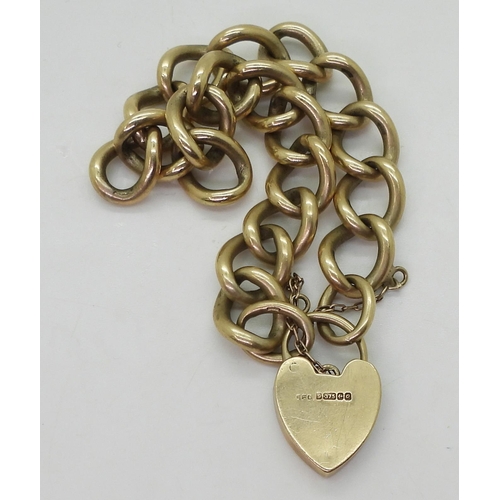 700 - A 9ct gold curb chain bracelet with a heart shaped clasp, length 18cm, weight 50.5cm