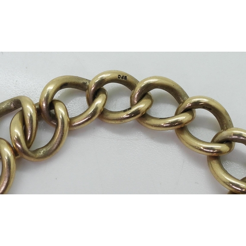 700 - A 9ct gold curb chain bracelet with a heart shaped clasp, length 18cm, weight 50.5cm