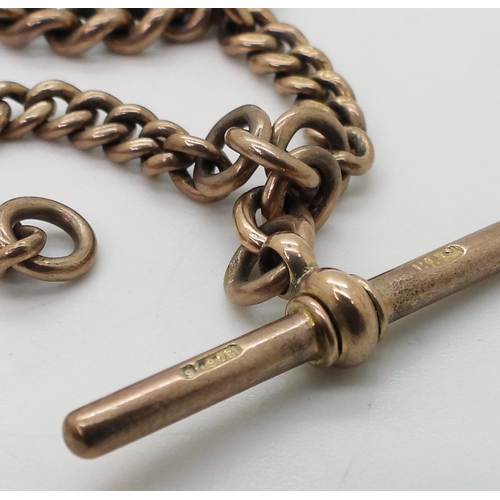 701 - A 9ct rose gold tapered fob chain. Stamped .375 9 to every link, the 'T' bar  and the clasp. Le... 