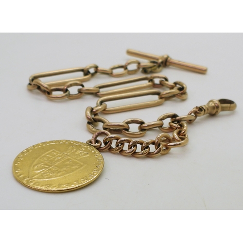 703 - A 9ct gold fancy link fob chain, hallmarked 9.375 to every link the 'T'bar and and clasp. Length 26c... 