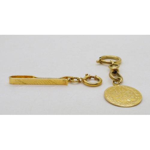 704 - A collection of yellow metal items, a diamond cut tie slide stamped 90% with Chinese characters, an ... 